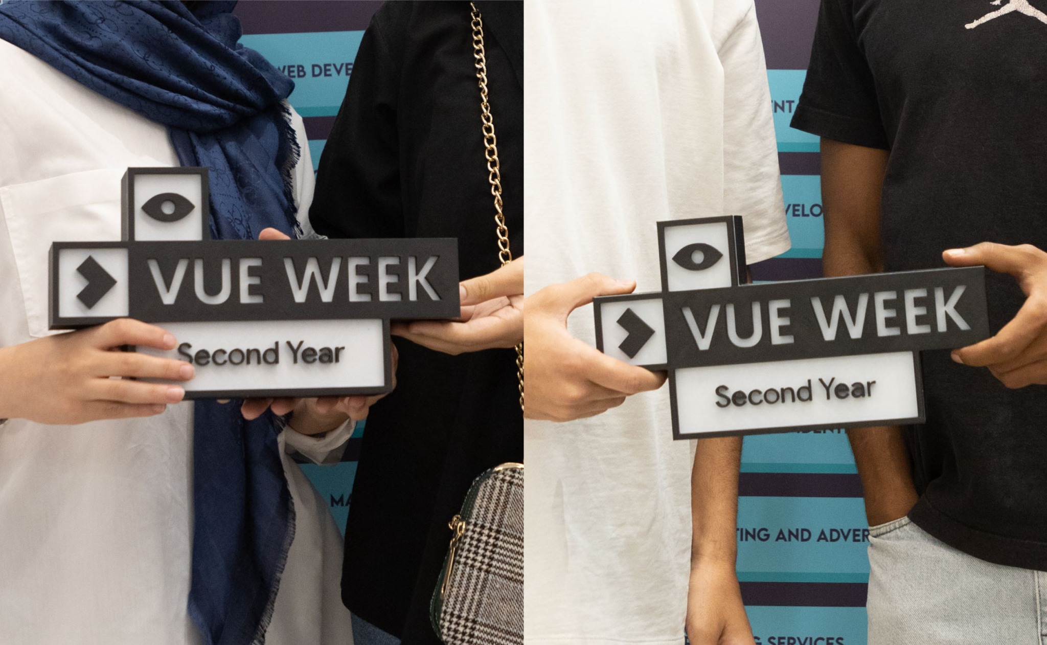Attendees holding the VUE WEEK 3D identity object